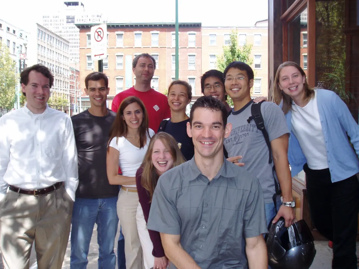Jorgensen group members outside a restaurant at a farewell dinner, 2005