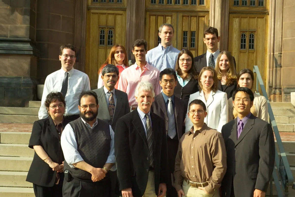 Group members and colleagues on the steps of Sterling Chemistry Laboratory at the 2005 symposium &ldquo;30 Years in the Trenches&rdquo;