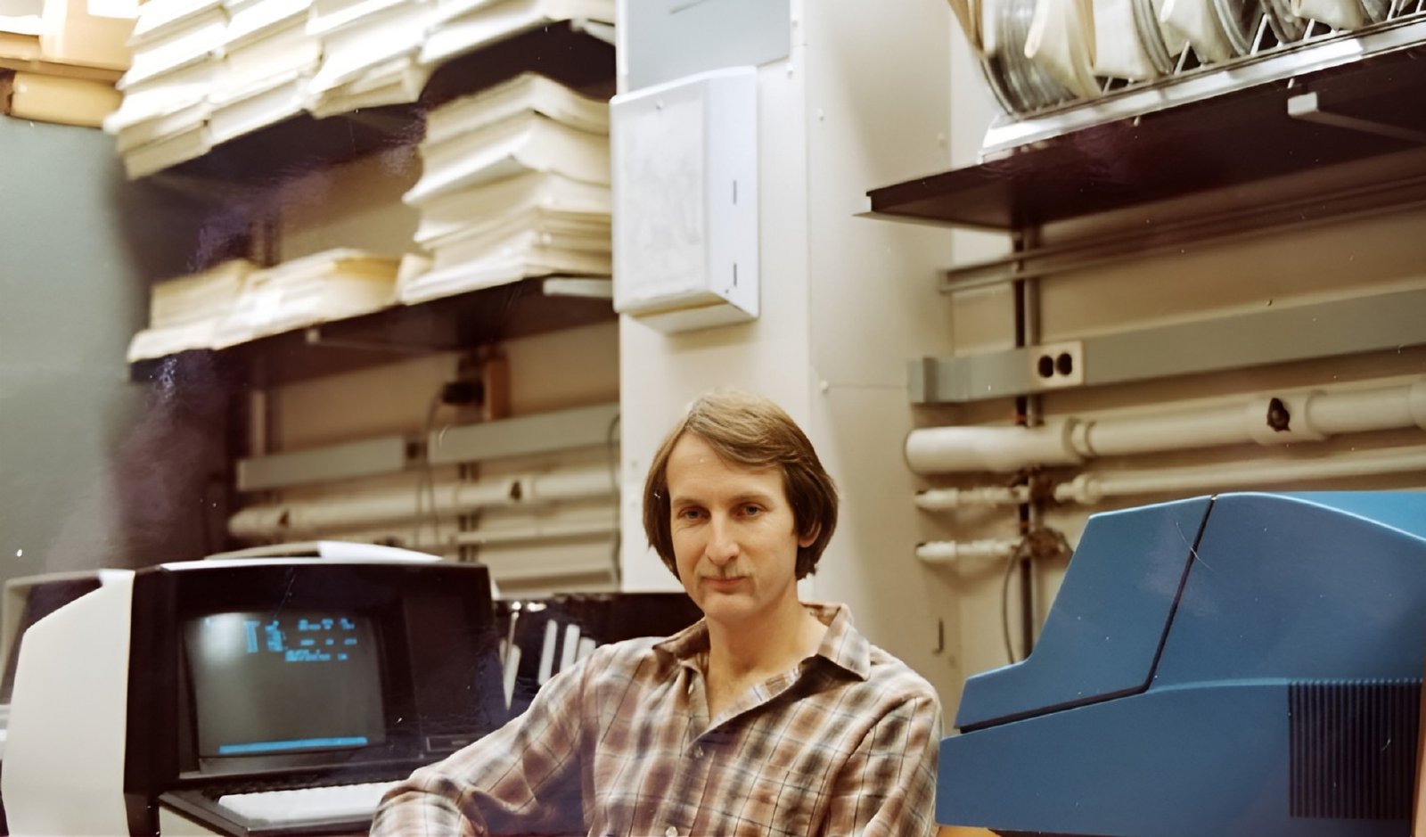 William L. Jorgensen at his Purdue laboratory in 1982, finalizing the Monte Carlo code that became BOSS